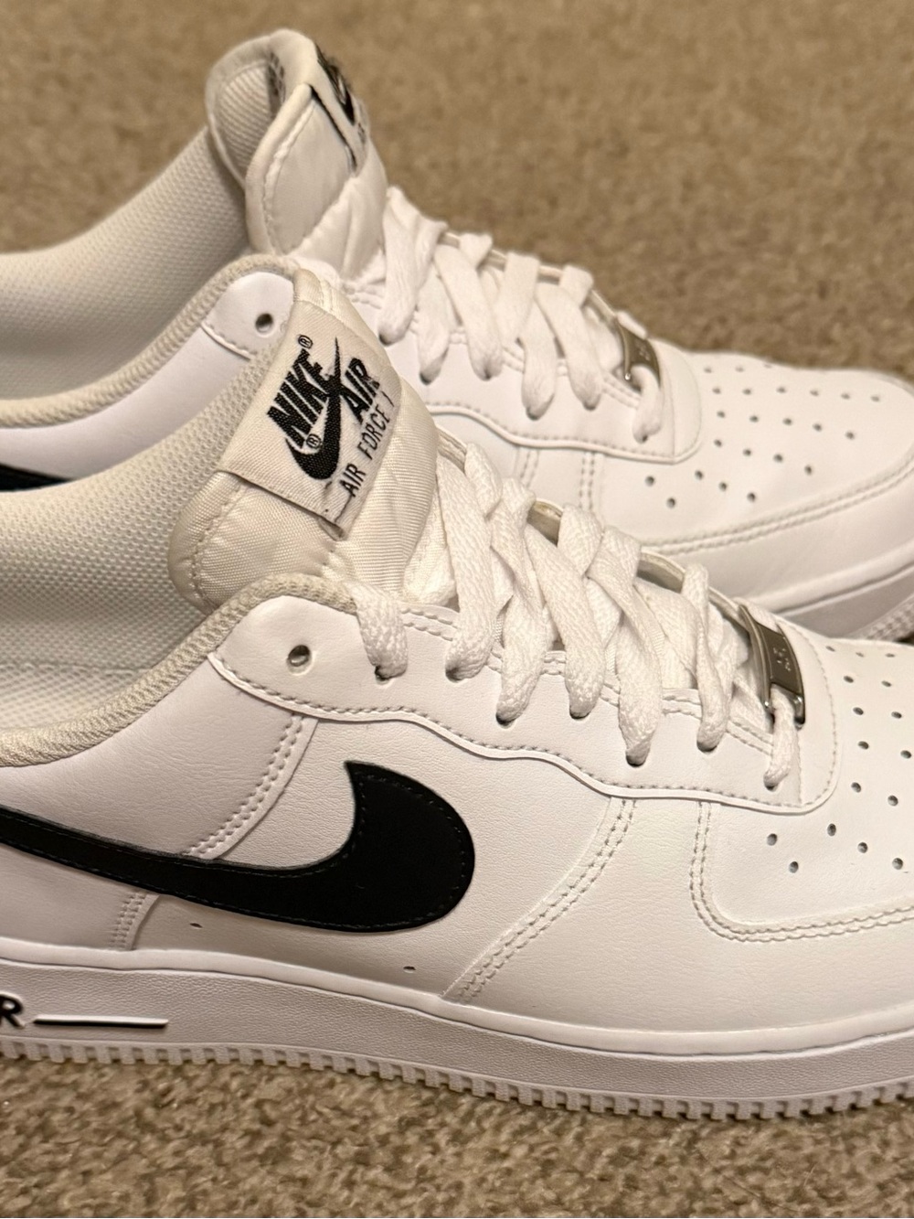 Nike Men’s White Sneakers with Black Swoosh